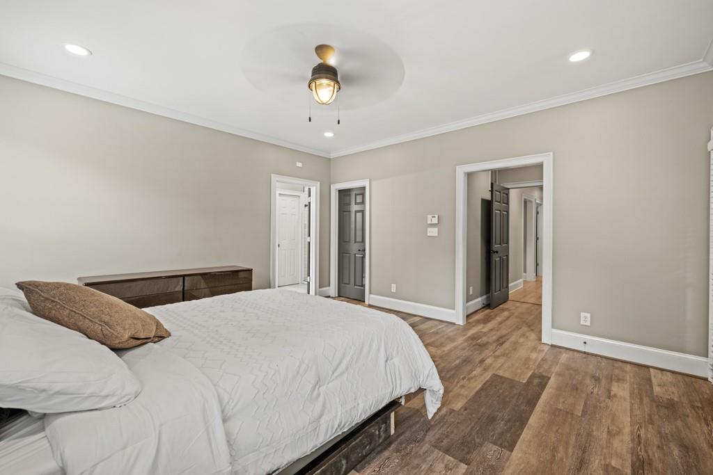 2230 Ewing Chapel Road Dacula, GA 30019 - Photo 20 of 54 a bedroom with a bed and a window