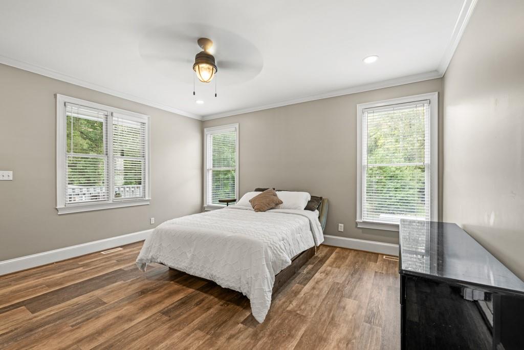 2230 Ewing Chapel Road Dacula, GA 30019 - Photo 21 of 54 a bedroom with a bed and a window