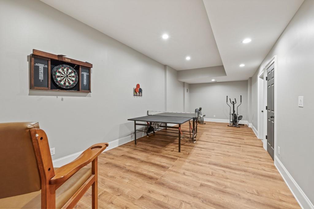 2230 Ewing Chapel Road Dacula, GA 30019 - Photo 31 of 54 a living room with furniture and a table