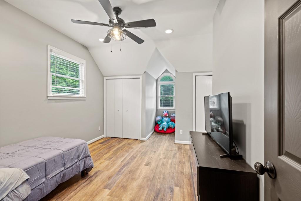 2230 Ewing Chapel Road Dacula, GA 30019 - Photo 37 of 54 a bedroom with bed and flat screen tv