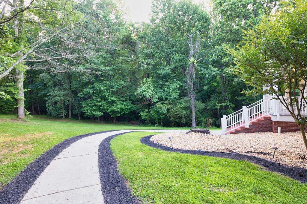 2230 Ewing Chapel Road Dacula, GA 30019 - Photo 8 of 54 a view of a park with trees