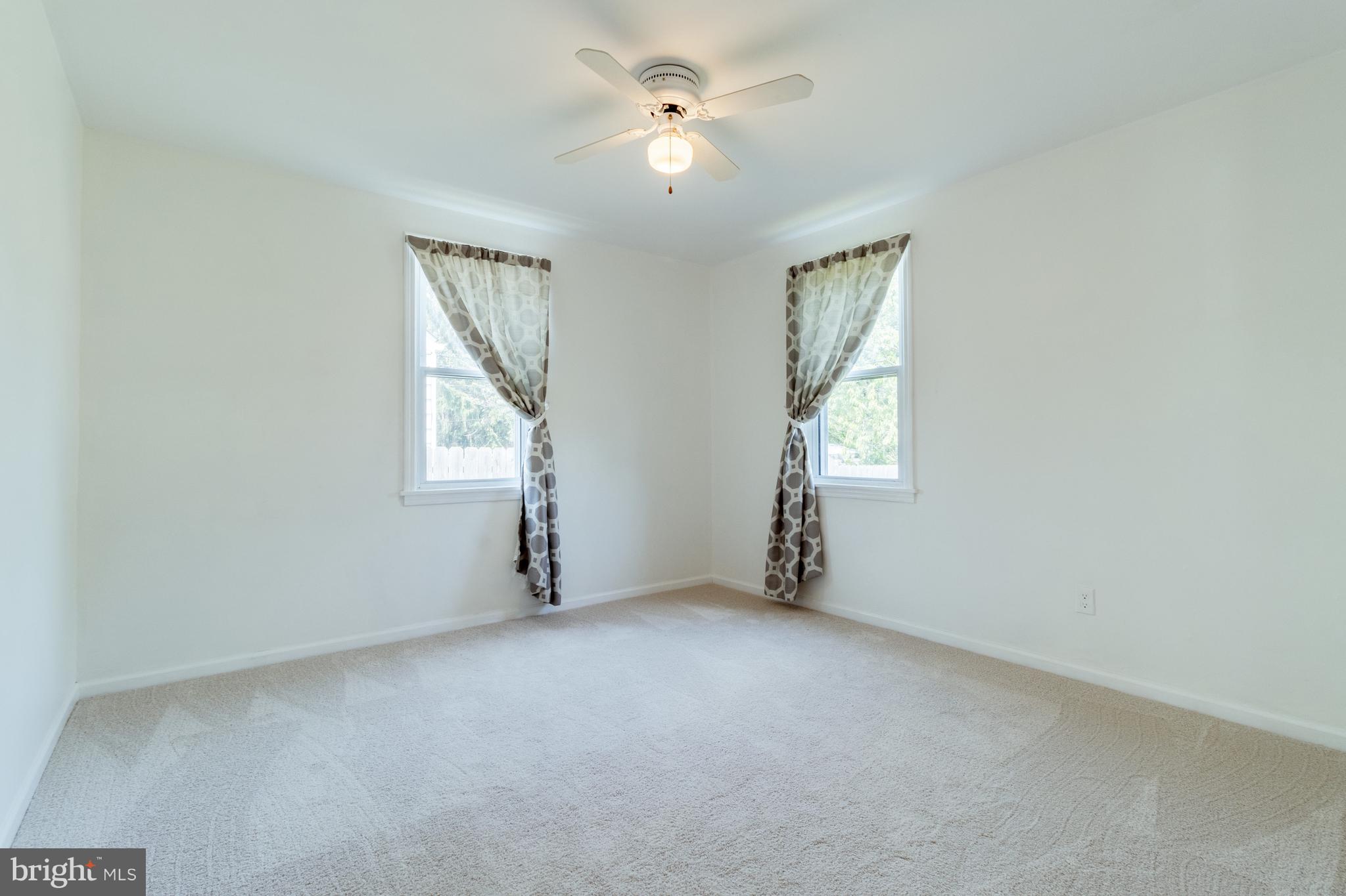 317 Olga Road Wilmington, DE 19805 - Photo 10 of 34 Main level bedroom with new carpeting