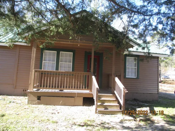 a view of a house with a roof deck