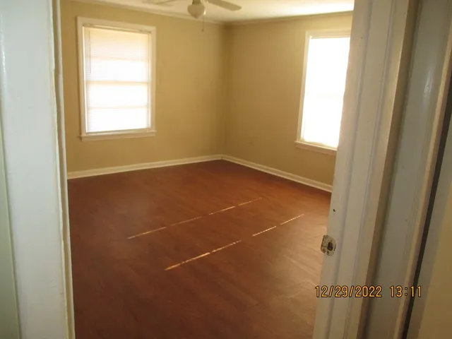 a view of a room that has a window in it