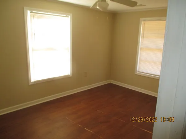 a view of a window in an empty room