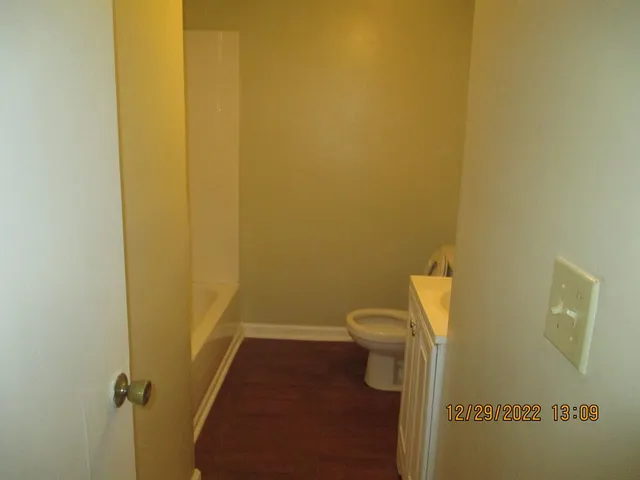 a bathroom with a sink and a toilet