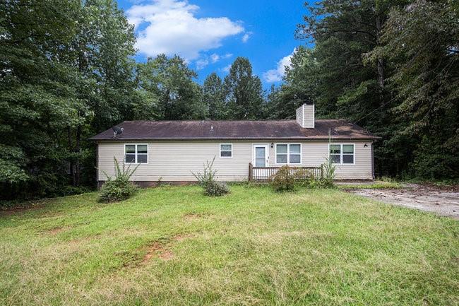 8955 Ochil Lane Winston, GA 30187 - Photo 1 of 31 front view of a house with yard