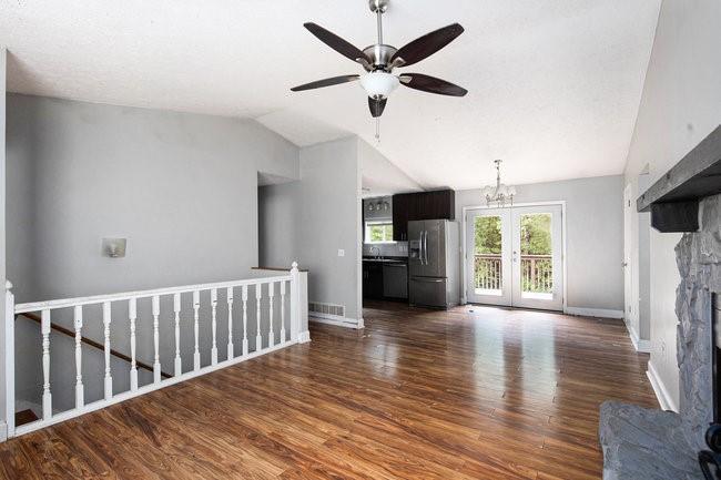 8955 Ochil Lane Winston, GA 30187 - Photo 6 of 31 a view of a kitchen with a sink cabinets and wooden floor