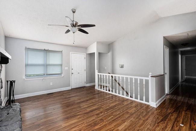 8955 Ochil Lane Winston, GA 30187 - Photo 7 of 31 a view of a room with wooden floor fan and windows