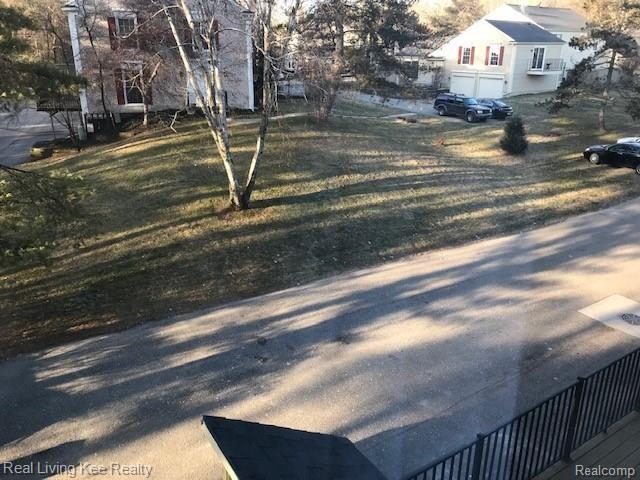1403 Paddle Wheel Lane Rochester, MI 48306 - Photo 46 of 54 Bonus to being an end unit this condo has ample parking