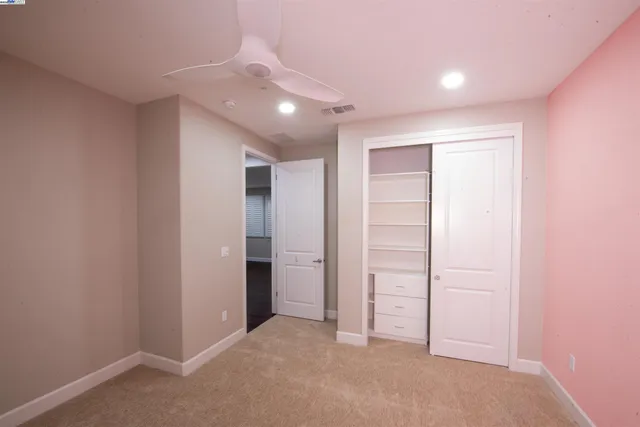 an empty room with closet