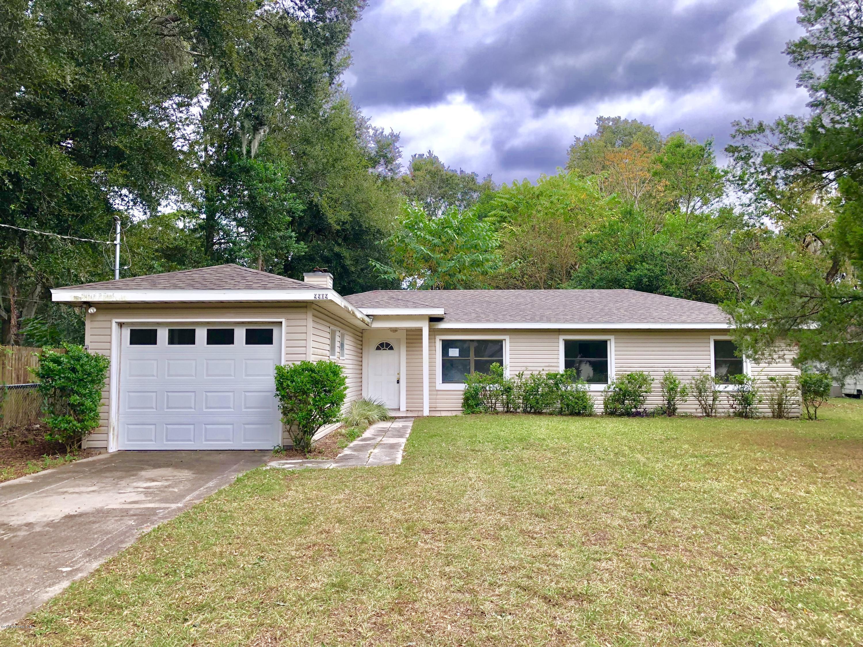 9909 Arnold Road Jacksonville, FL 32246 - Photo 1 of 18 Front