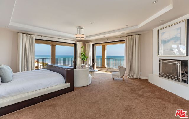 a large bathroom with a double vanity sink and a mirror