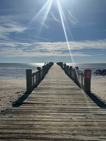 a view of stairs and an wooden floor