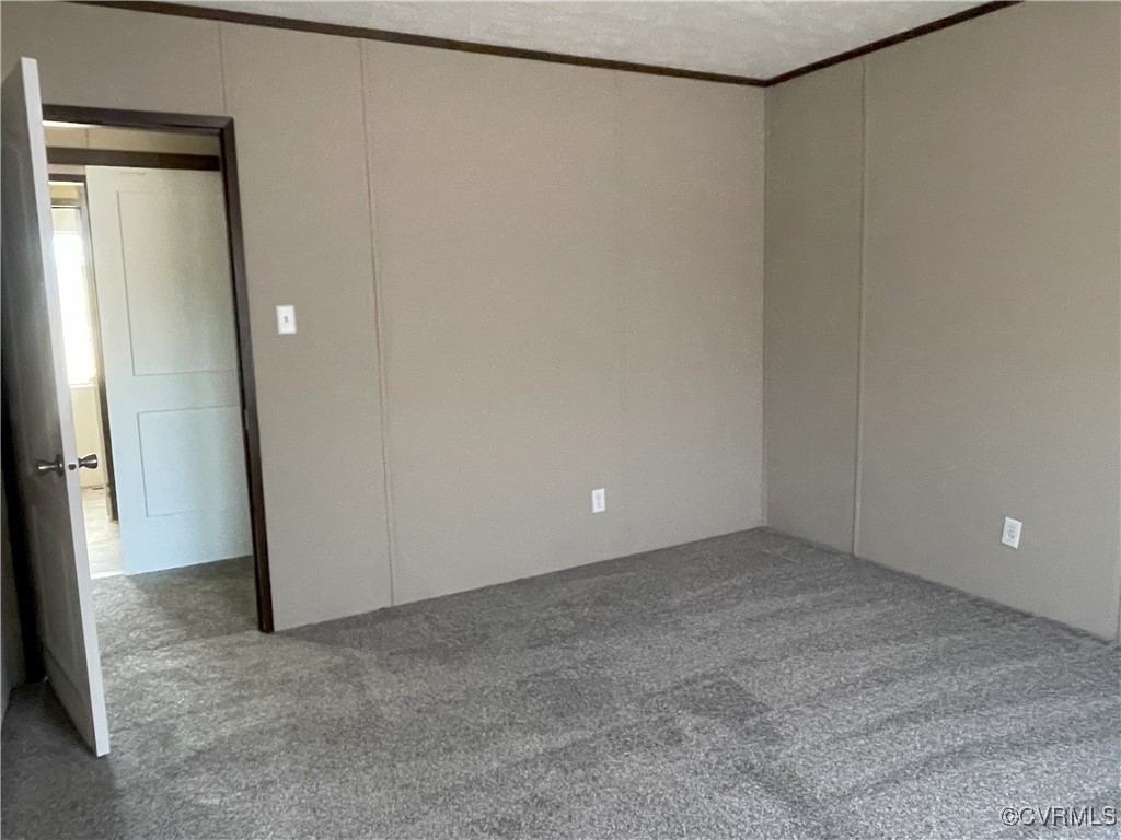 26286 Peters Bridge Road Courtland, VA 23837 - Photo 31 of 32 Unfurnished room with carpet