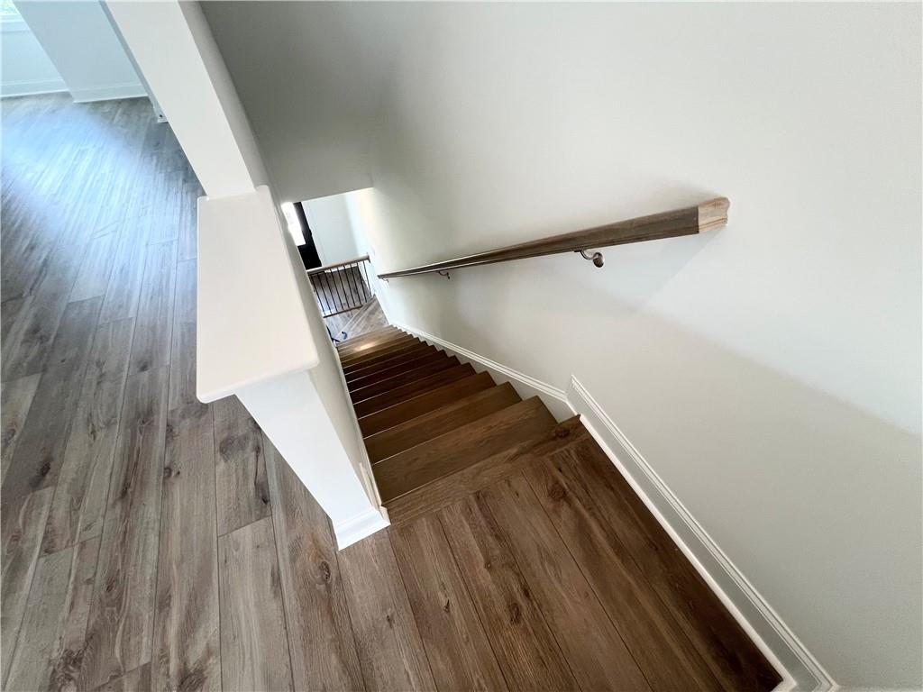 635 Silva Street, Unit 131 Cumming, GA 30040 - Photo 44 of 67 a view of entryway with wooden floor