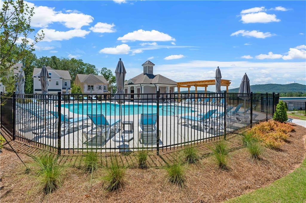 635 Silva Street, Unit 131 Cumming, GA 30040 - Photo 52 of 67 a view of a wrought iron fences in front of house