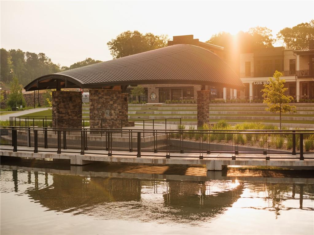 635 Silva Street, Unit 131 Cumming, GA 30040 - Photo 63 of 67 a view of swimming pool and lake view