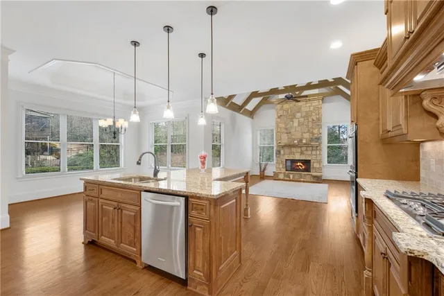 a white bath tub sitting next to a shower