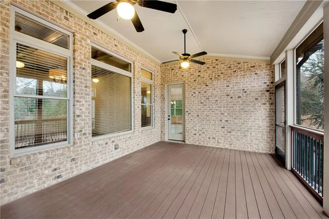 a kitchen with granite countertop cabinets stainless steel appliances and a sink