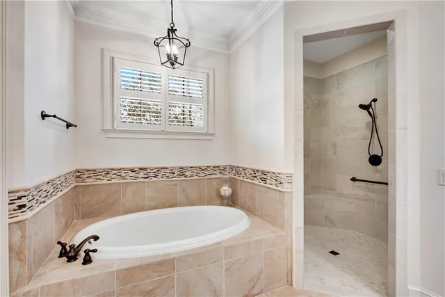 an aerial view of a house with a yard and sitting space