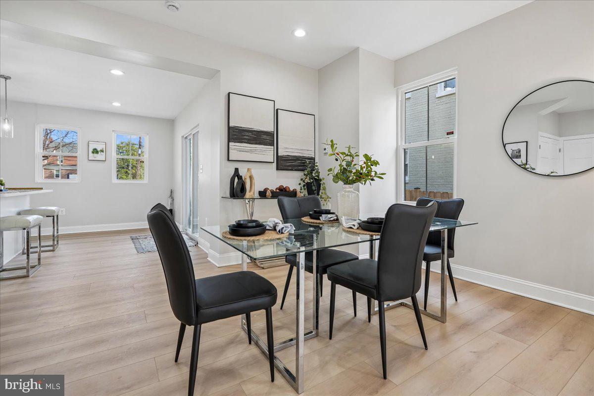 17 Longfellow Street Northwest Washington, DC 20011 - Photo 15 of 41 a view of a dining room with furniture and wooden floor