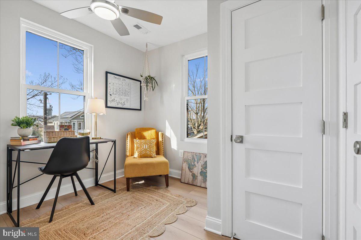 17 Longfellow Street Northwest Washington, DC 20011 - Photo 24 of 41 a living room with furniture and a window