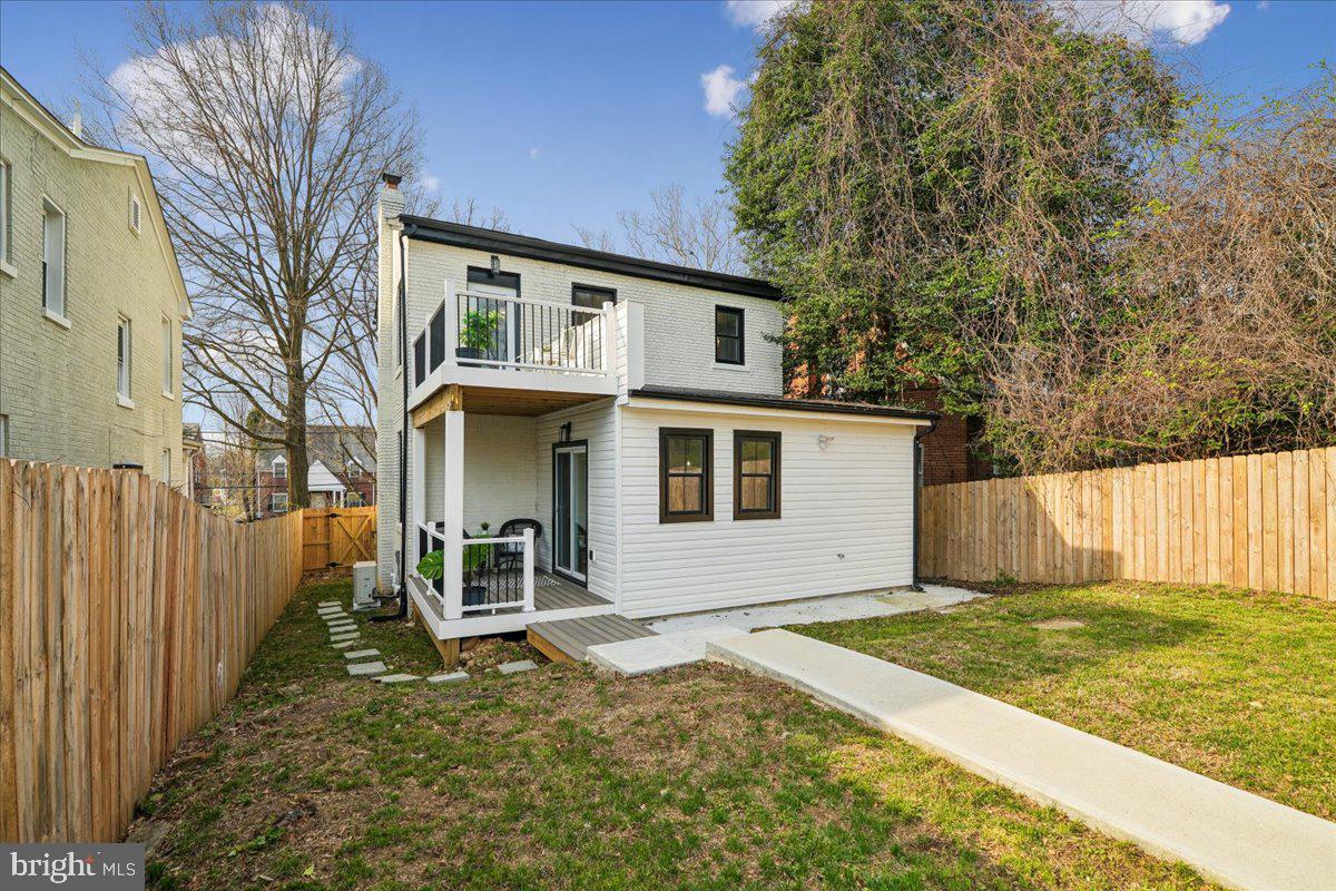 17 Longfellow Street Northwest Washington, DC 20011 - Photo 36 of 41 a front view of a house with a yard