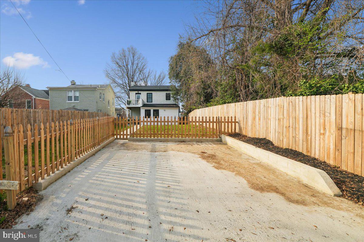 17 Longfellow Street Northwest Washington, DC 20011 - Photo 38 of 41 a view of backyard space with deck and trees