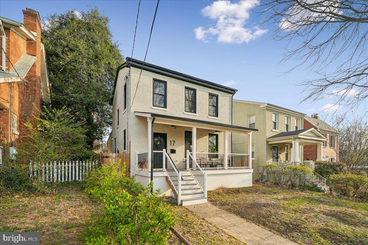 17 Longfellow Street Northwest Washington, DC 20011 - Photo 40 of 41 a front view of a house with a yard