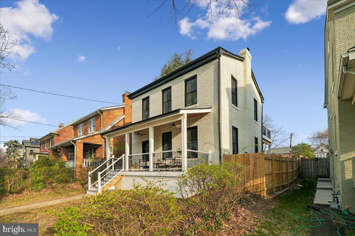 17 Longfellow Street Northwest Washington, DC 20011 - Photo 41 of 41 a front view of a house with a yard