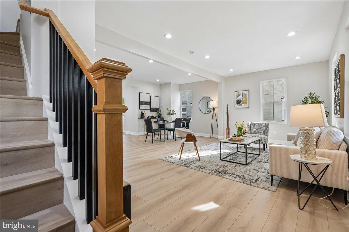 17 Longfellow Street Northwest Washington, DC 20011 - Photo 6 of 41 a living room with furniture and a table