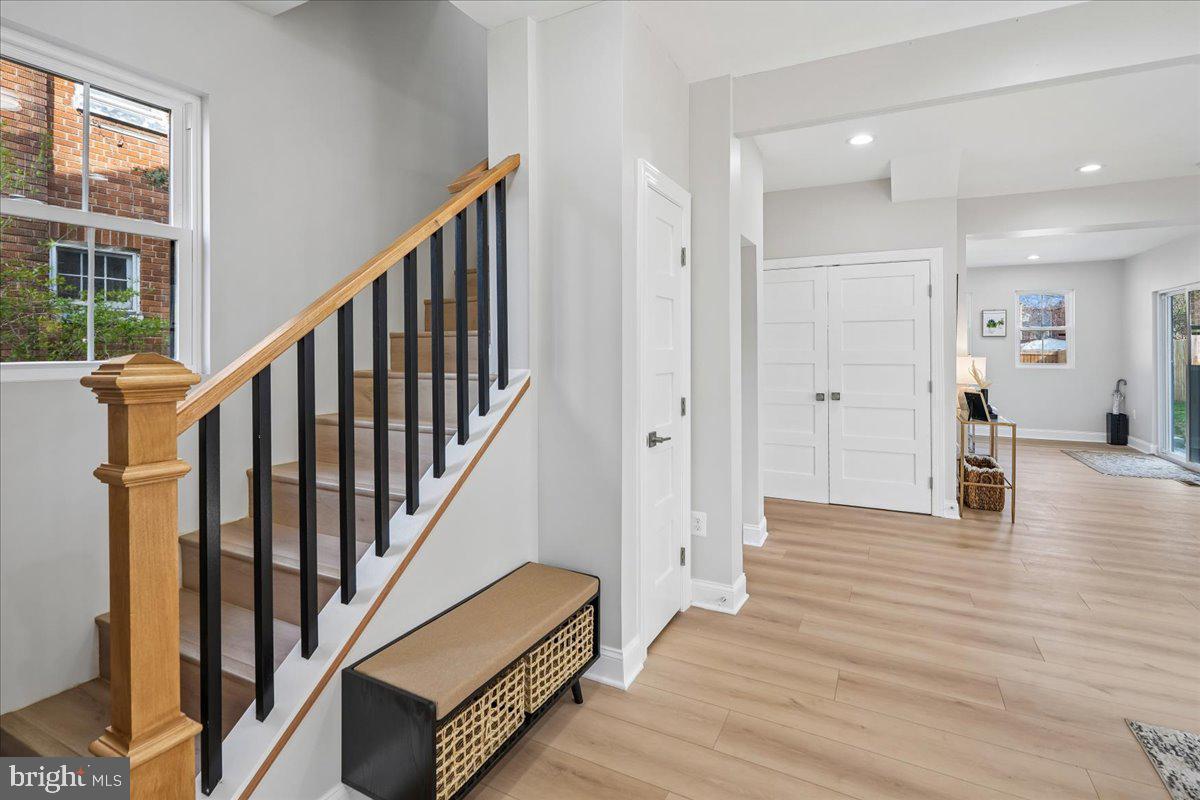 17 Longfellow Street Northwest Washington, DC 20011 - Photo 7 of 41 a view of an entryway with wooden floor and stairs