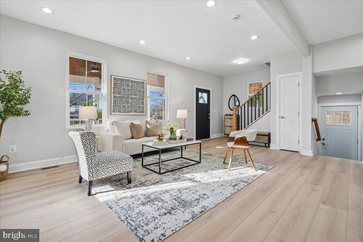 17 Longfellow Street Northwest Washington, DC 20011 - Photo 9 of 41 a living room with furniture and a wooden floor