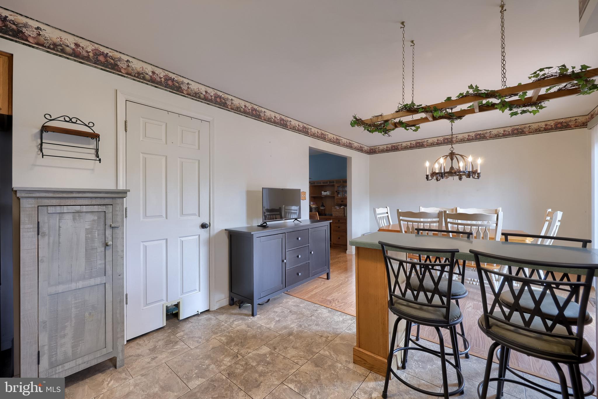 105 Bainbridge Circle Reading, PA 19608 - Photo 15 of 36 a dining room with furniture and window