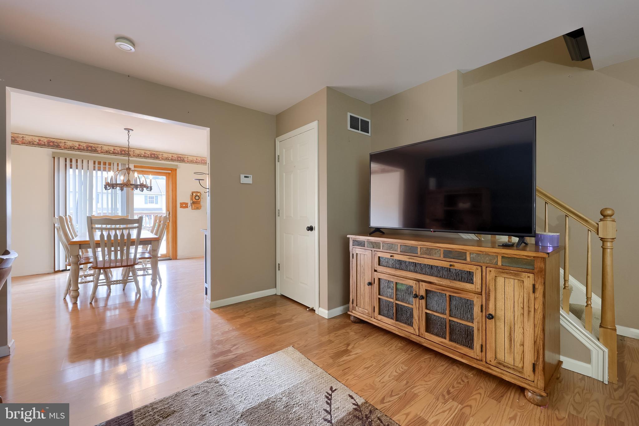 105 Bainbridge Circle Reading, PA 19608 - Photo 18 of 36 a living room with furniture and a flat screen tv