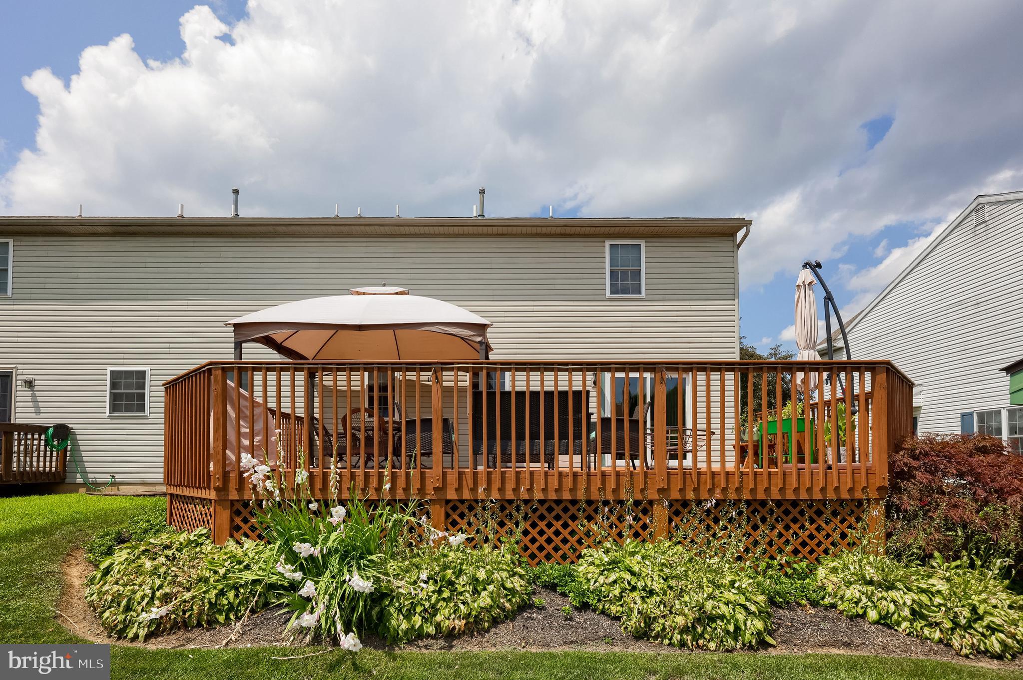 105 Bainbridge Circle Reading, PA 19608 - Photo 30 of 36 a view of a porch with a bench