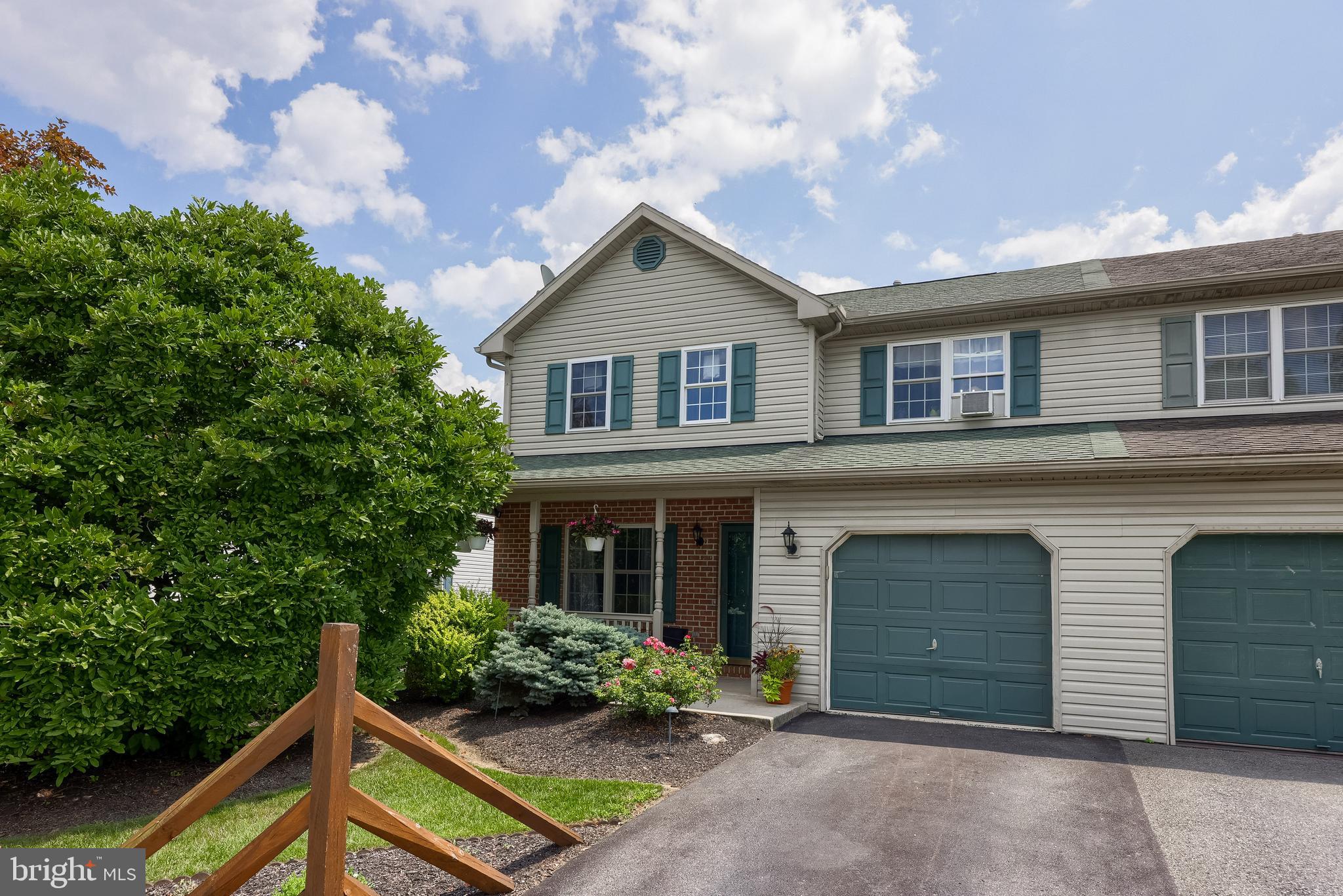 105 Bainbridge Circle Reading, PA 19608 - Photo 4 of 36 a house view with a garden space
