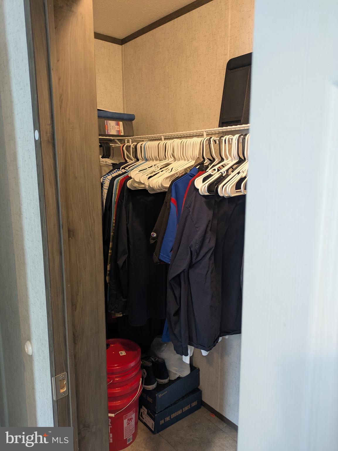 312 Berts Drive Lothian, MD 20711 - Photo 14 of 28 a view of walk in closet with clothes