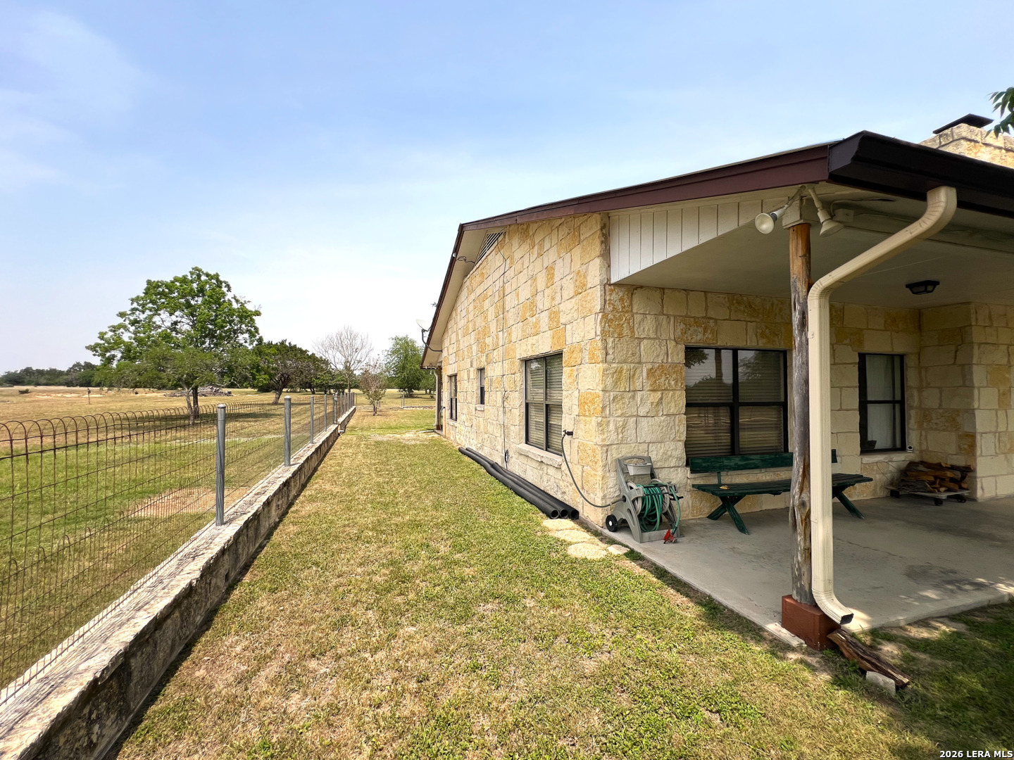 1220 Flying T Ranch Road Bandera, TX 78003 - Photo 12 of 27 a view of swimming pool with an outdoor seating