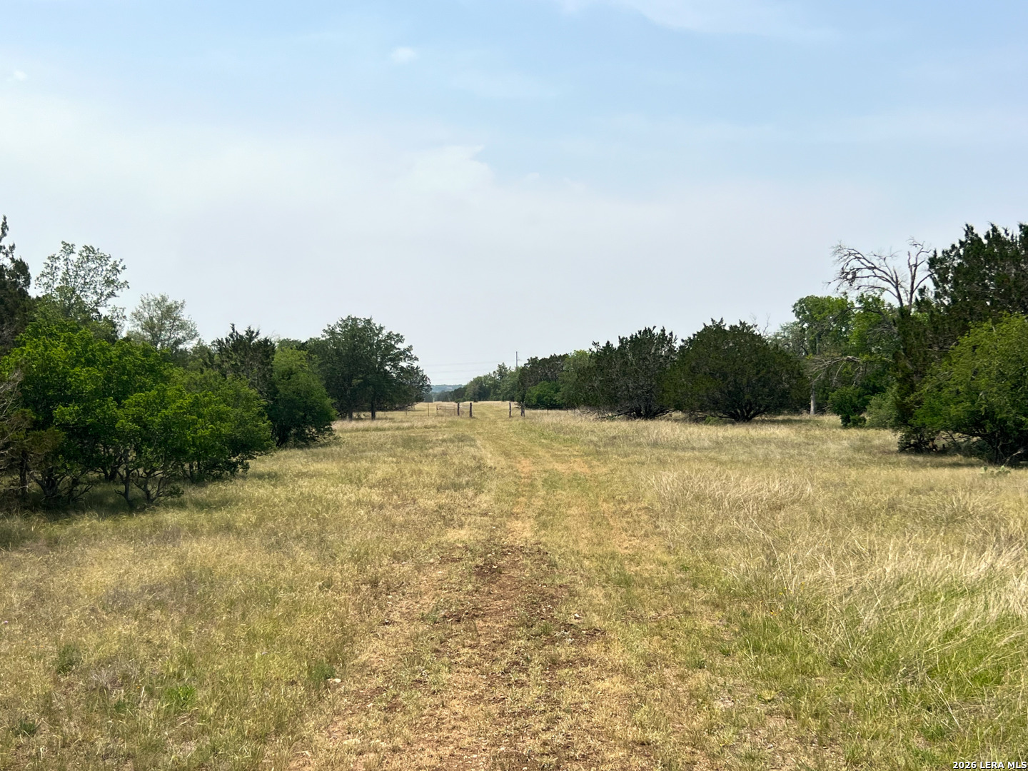 1220 Flying T Ranch Road Bandera, TX 78003 - Photo 18 of 27 a view of lake and mountain view