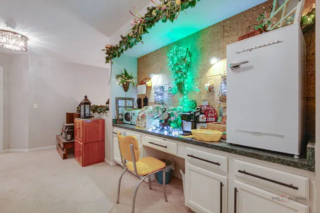 a room with a table and chairs