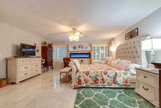 a bedroom with a bed and furniture