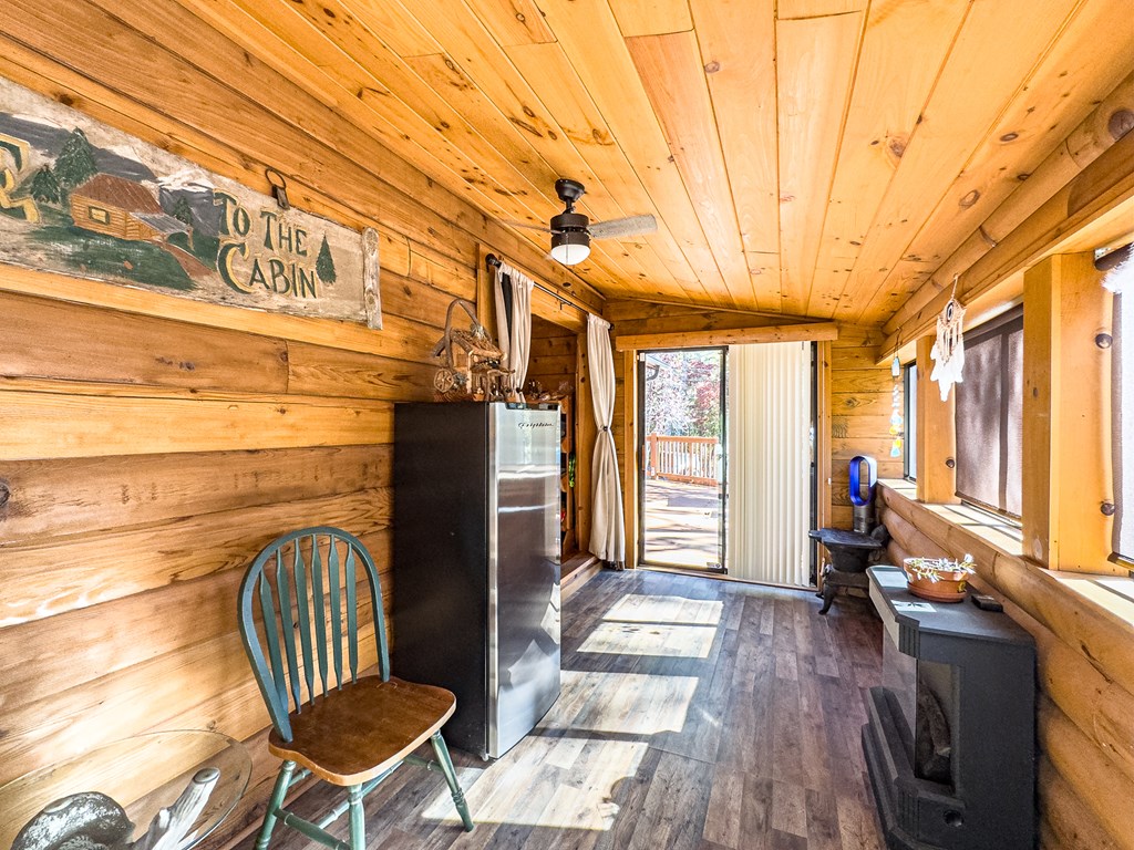 614 Rockridge Road Murphy, NC 28906 - Photo 14 of 43 a living room with furniture a fireplace and a large window
