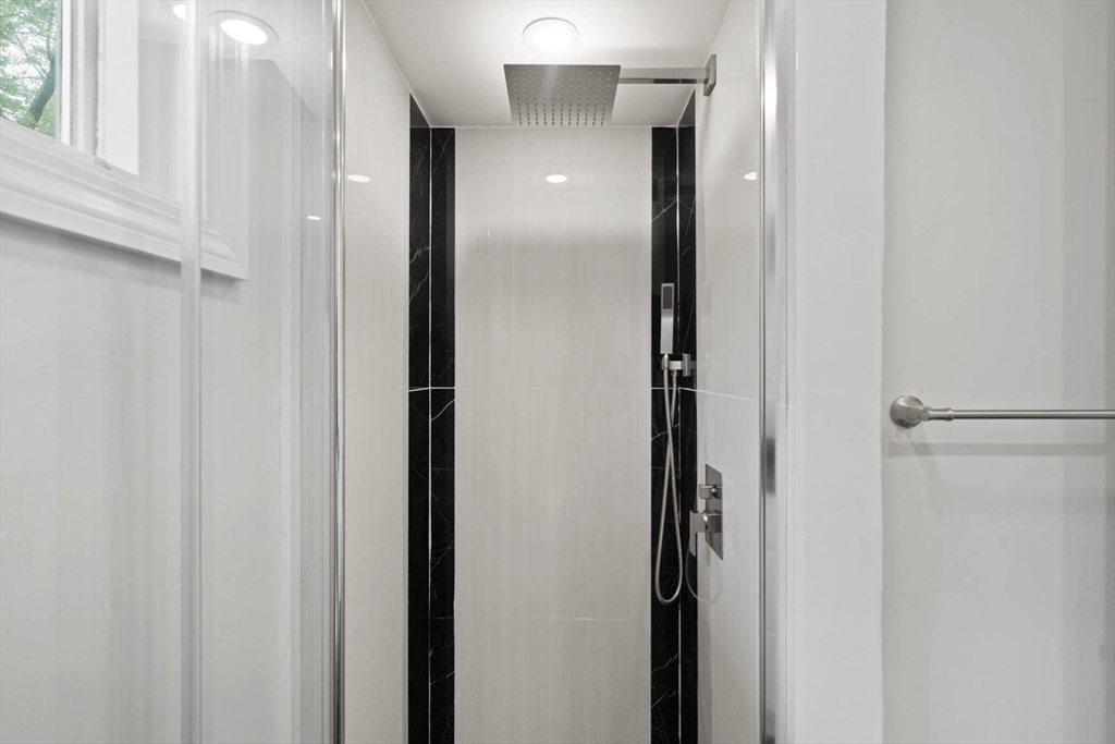 7 Thornberry Road Winchester, MA 01890 - Photo 19 of 35 a view of a bathroom from a hallway