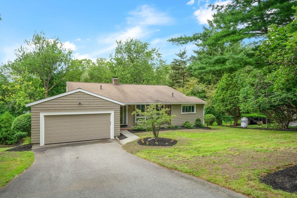 7 Thornberry Road Winchester, MA 01890 - Photo 30 of 35 a front view of a house with yard and green space