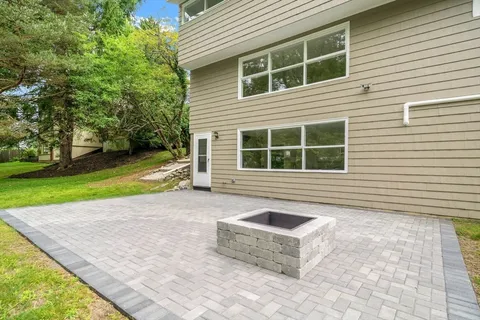 a house view with a backyard space