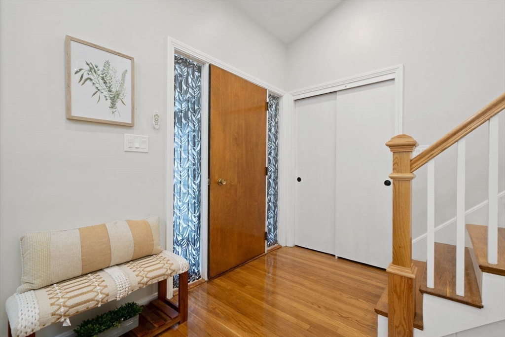 7 Thornberry Road Winchester, MA 01890 - Photo 8 of 35 a bedroom with a bed and furniture with wooden floor