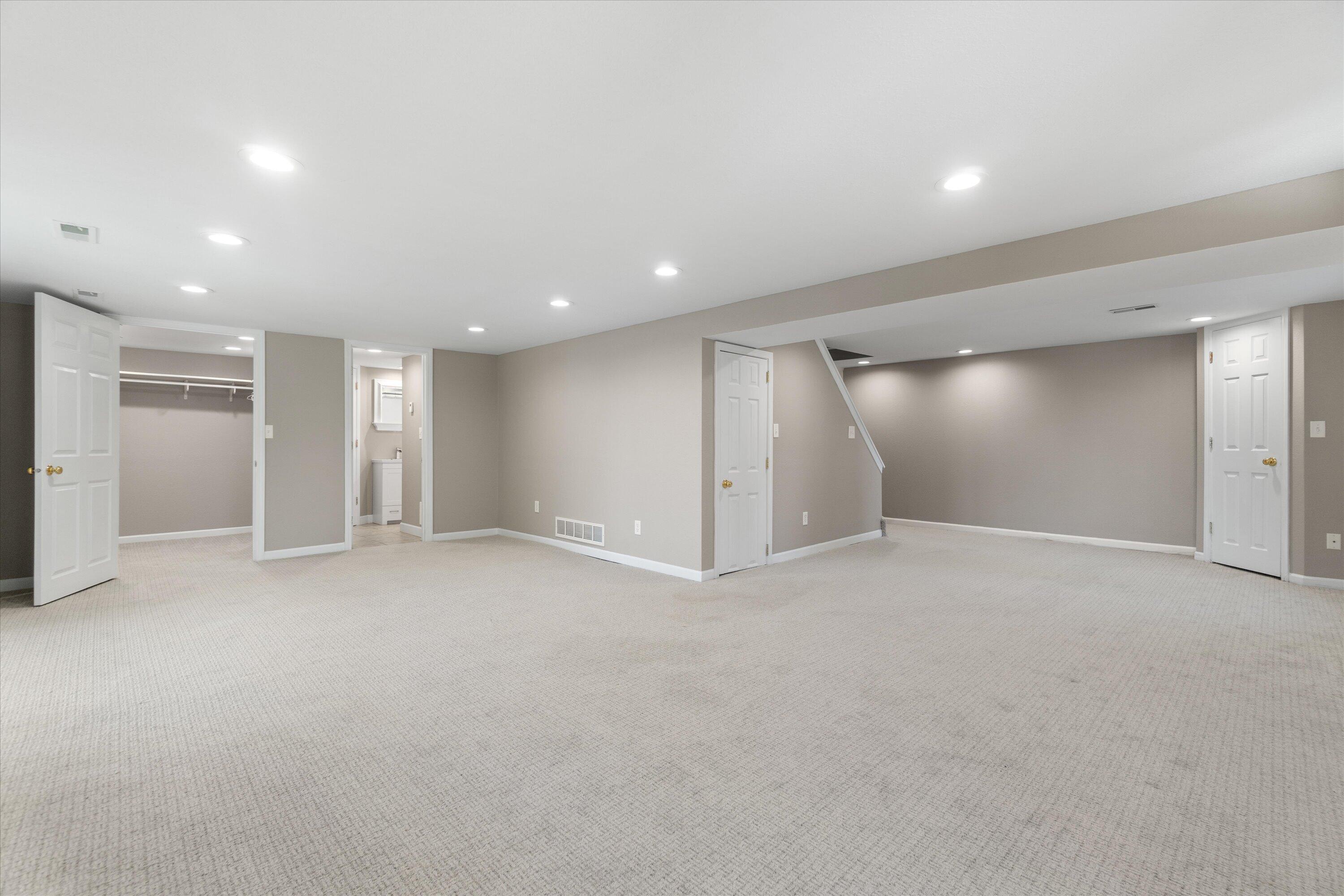 N39W27485 Hillside Grove Road Pewaukee, WI 53072 - Photo 21 of 43 lower level family room