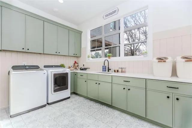 a bathroom with a double vanity sink toilet mirror and shower